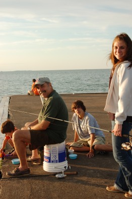 Jessie, her brothers and dad, fishing at family vacation spot, Lakeside, Ohio.